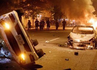 Manifestantes responden al toque de queda decretado Washington
