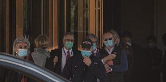 OMS investiga origen de COVID-19 en mercado de Wuhan