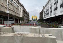 Muros de concreto blindan Zócalo ante protesta de padres de Ayotzinapa